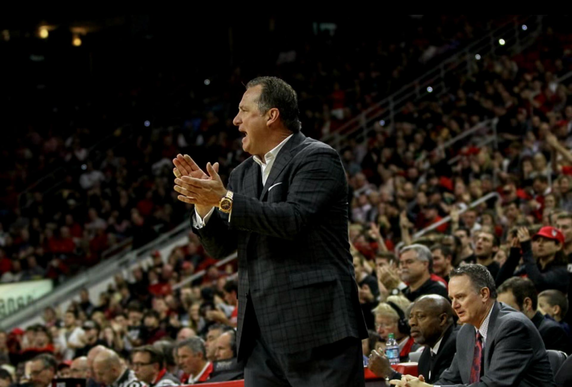 Coach Mark Gottfried coaching basketball in an arena