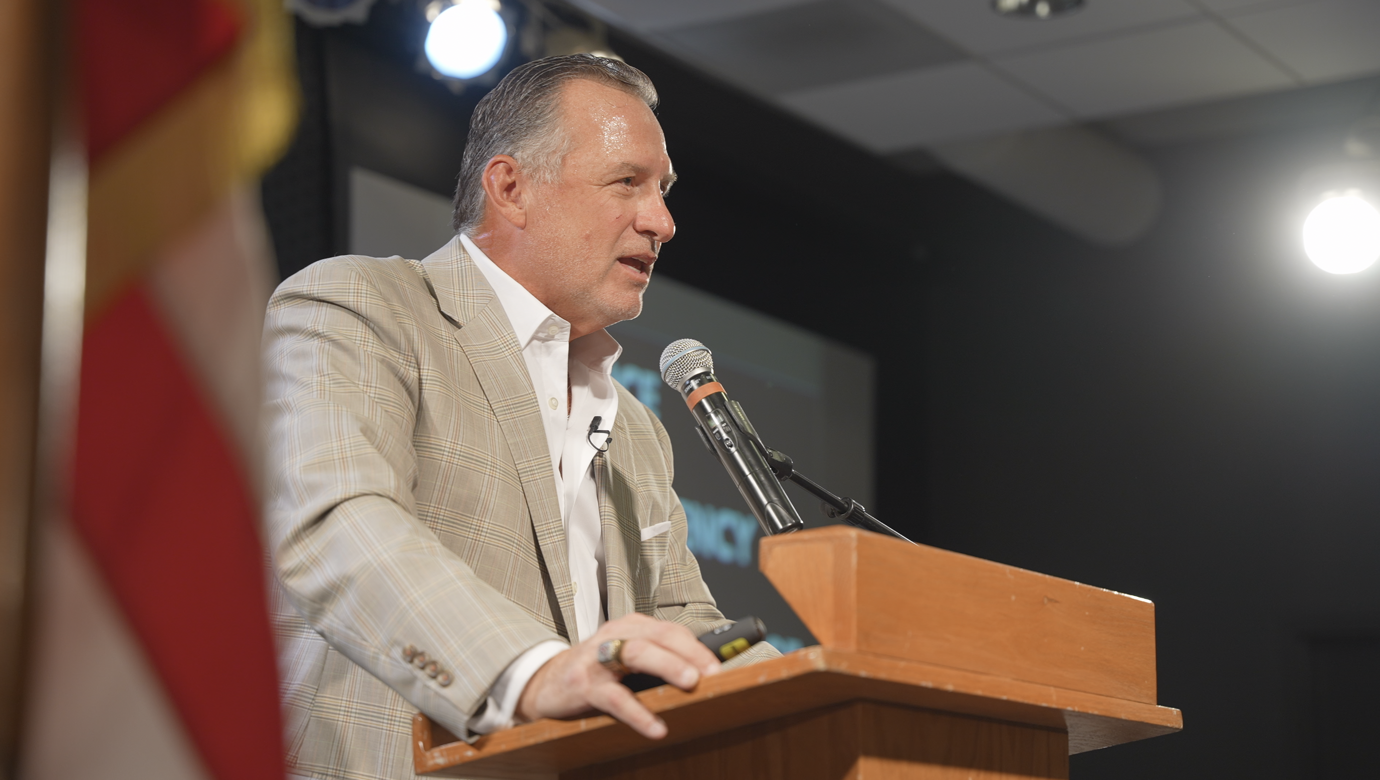 Mark Gottfried speaking at a podium