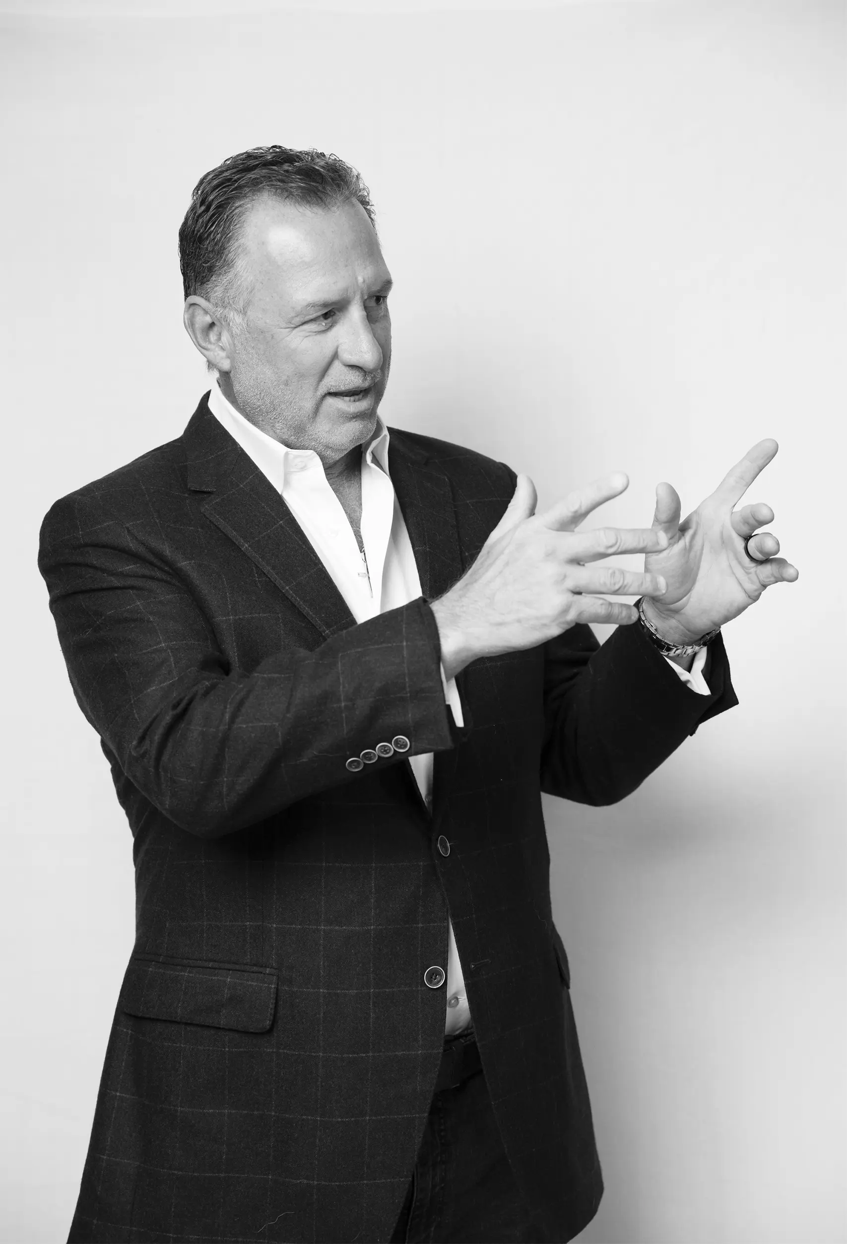 Coach Mark Gottfried pointing to the right